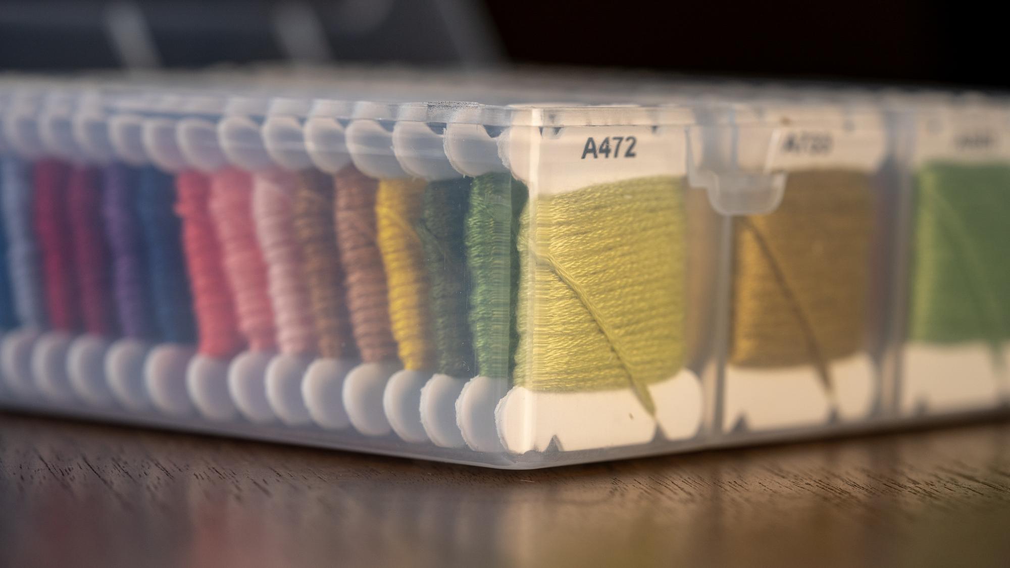 Selection of embroidered sample patches in rows